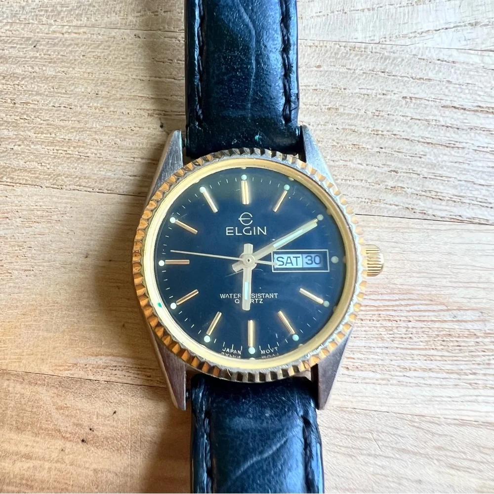 Vintage Elgin ladies black and gold tone dress watch NEW BATTERY